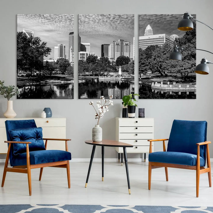 The living room features a captivating triptych titled "Charlotte City Cloudy Skyline Black and White Wall Art Cityscape Canvas Print," crafted on museum-quality canvas with UV-protective coating. Modern decor accentuates the dynamic scene.