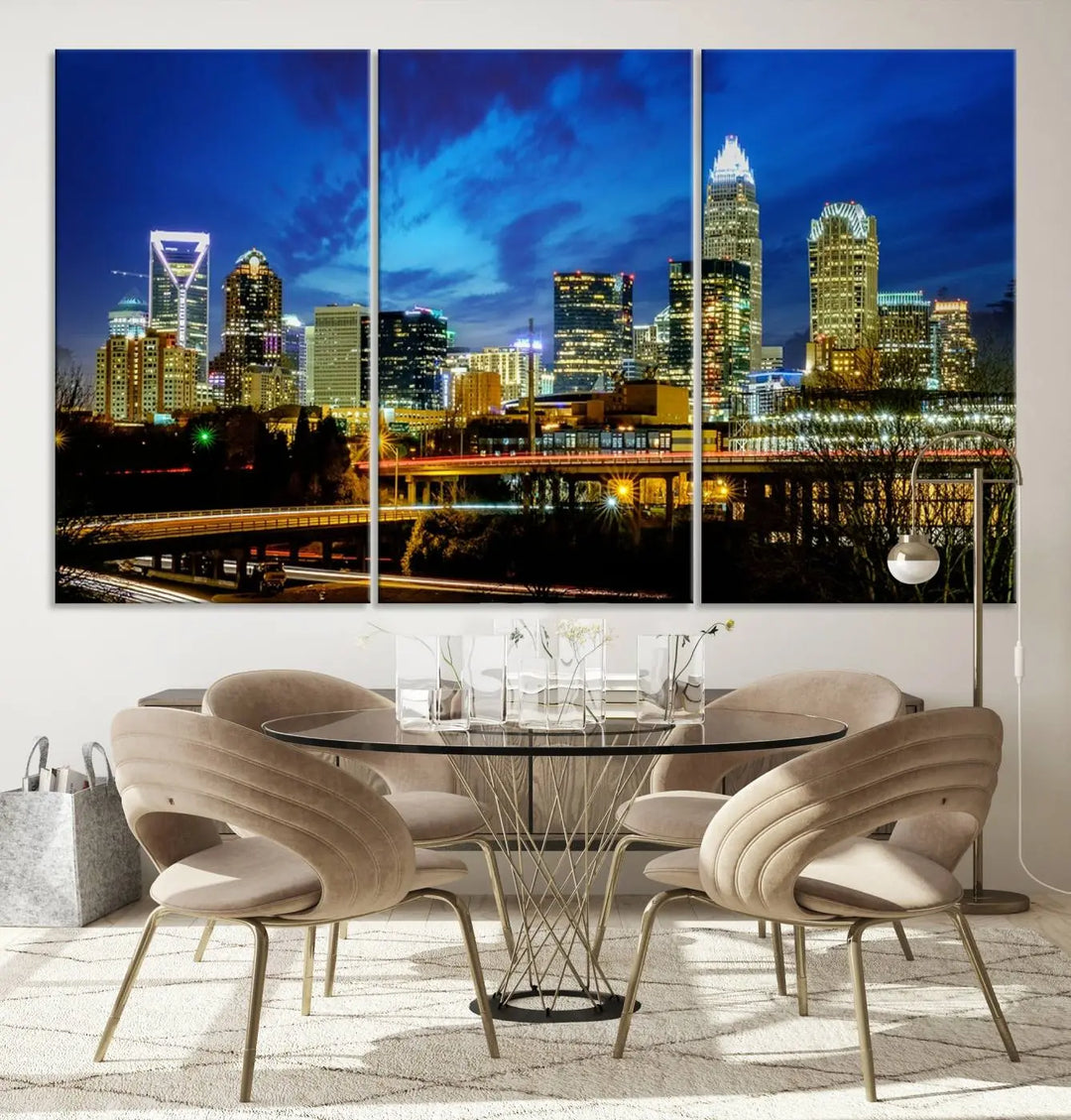 A modern living room highlighted by the "Charlotte City Lights Cloudy Blue Night Skyline Cityscape View" wall art canvas print, crafted on museum-quality canvas with UV-protective coating.