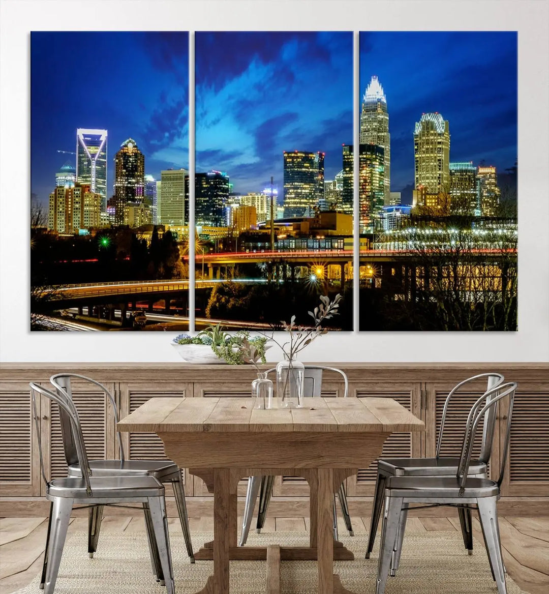 A modern living room highlighted by the "Charlotte City Lights Cloudy Blue Night Skyline Cityscape View" wall art canvas print, crafted on museum-quality canvas with UV-protective coating.