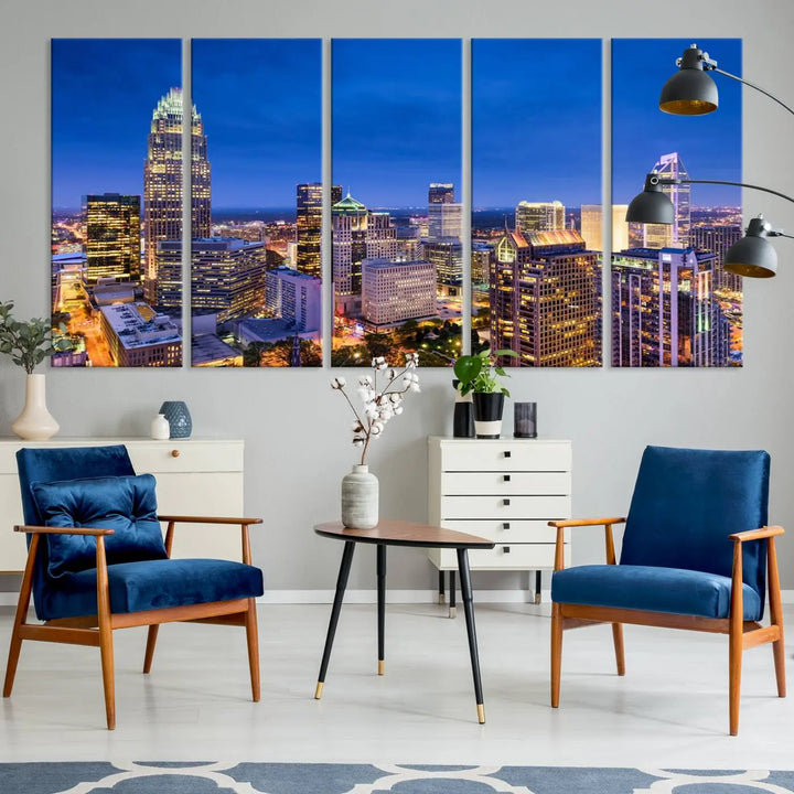 The living room features the "Charlotte City Lights Night Blue Skyline Cityscape View Wall Art Canvas Print" on museum-quality canvas with a UV-protective coating. Cozy and modern decor complements the ready-to-hang look.