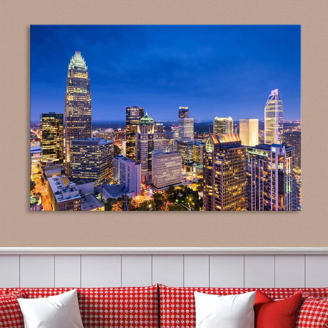 The living room features the "Charlotte City Lights Night Blue Skyline Cityscape View Wall Art Canvas Print" on museum-quality canvas with a UV-protective coating. Cozy and modern decor complements the ready-to-hang look.