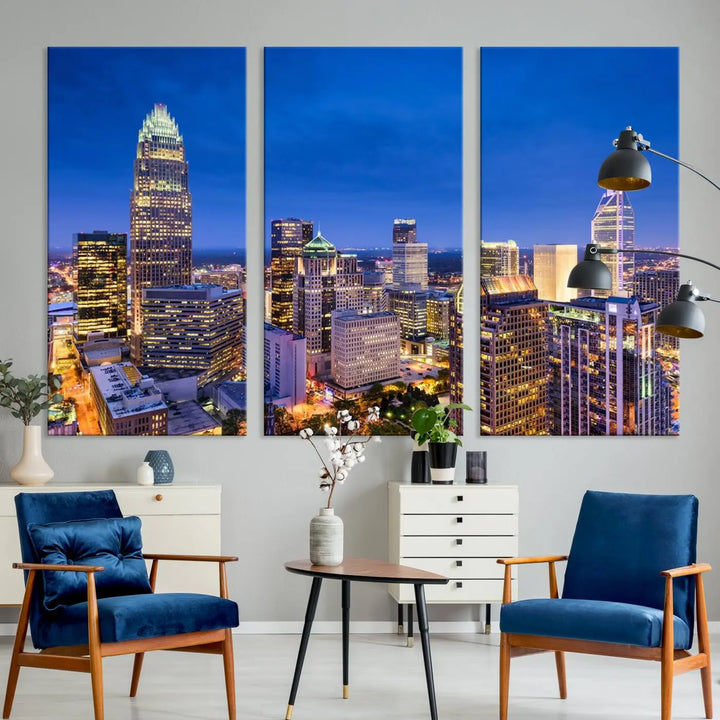 The living room features the "Charlotte City Lights Night Blue Skyline Cityscape View Wall Art Canvas Print" on museum-quality canvas with a UV-protective coating. Cozy and modern decor complements the ready-to-hang look.