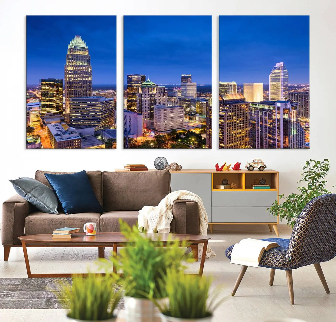 The living room features the "Charlotte City Lights Night Blue Skyline Cityscape View Wall Art Canvas Print" on museum-quality canvas with a UV-protective coating. Cozy and modern decor complements the ready-to-hang look.