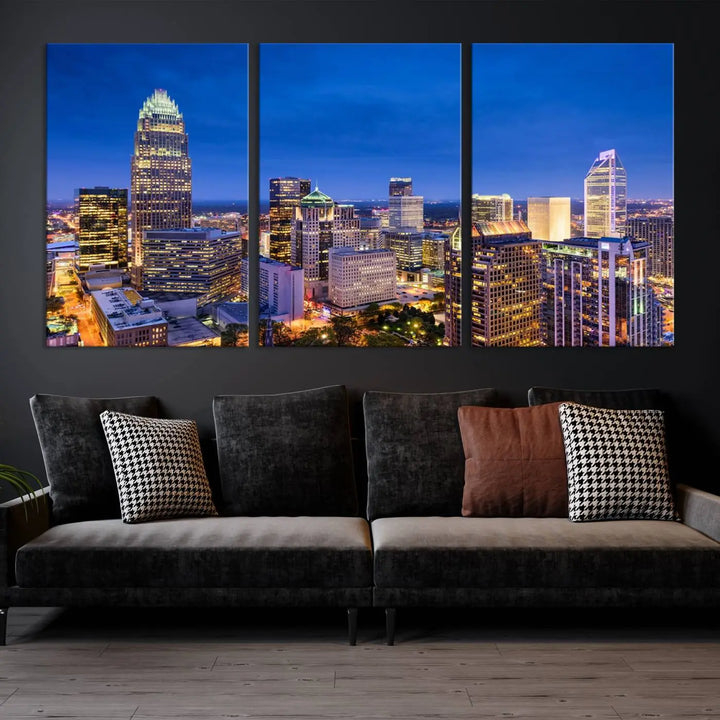 The living room features the "Charlotte City Lights Night Blue Skyline Cityscape View Wall Art Canvas Print" on museum-quality canvas with a UV-protective coating. Cozy and modern decor complements the ready-to-hang look.