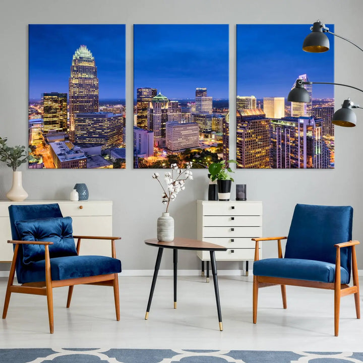 The living room features the "Charlotte City Lights Night Blue Skyline Cityscape View Wall Art Canvas Print" on museum-quality canvas with a UV-protective coating. Cozy and modern decor complements the ready-to-hang look.