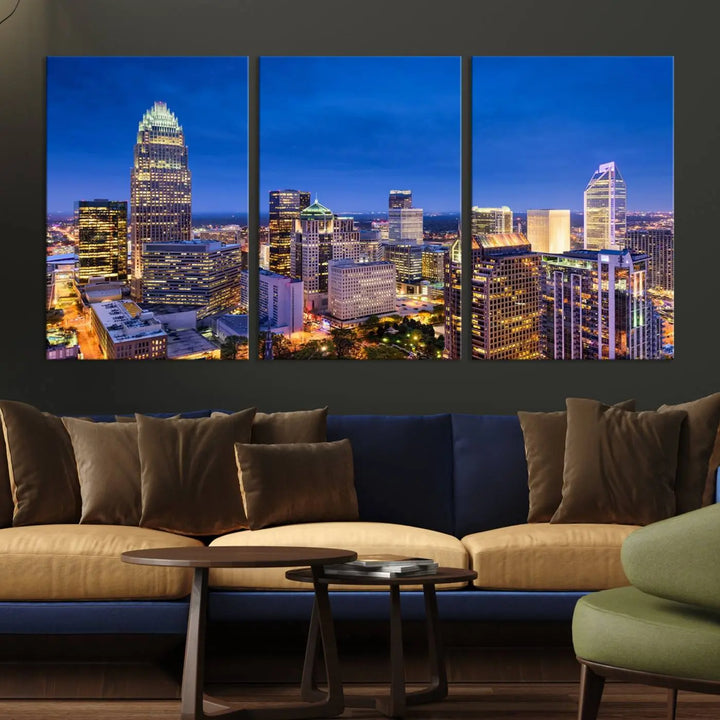 The living room features the "Charlotte City Lights Night Blue Skyline Cityscape View Wall Art Canvas Print" on museum-quality canvas with a UV-protective coating. Cozy and modern decor complements the ready-to-hang look.