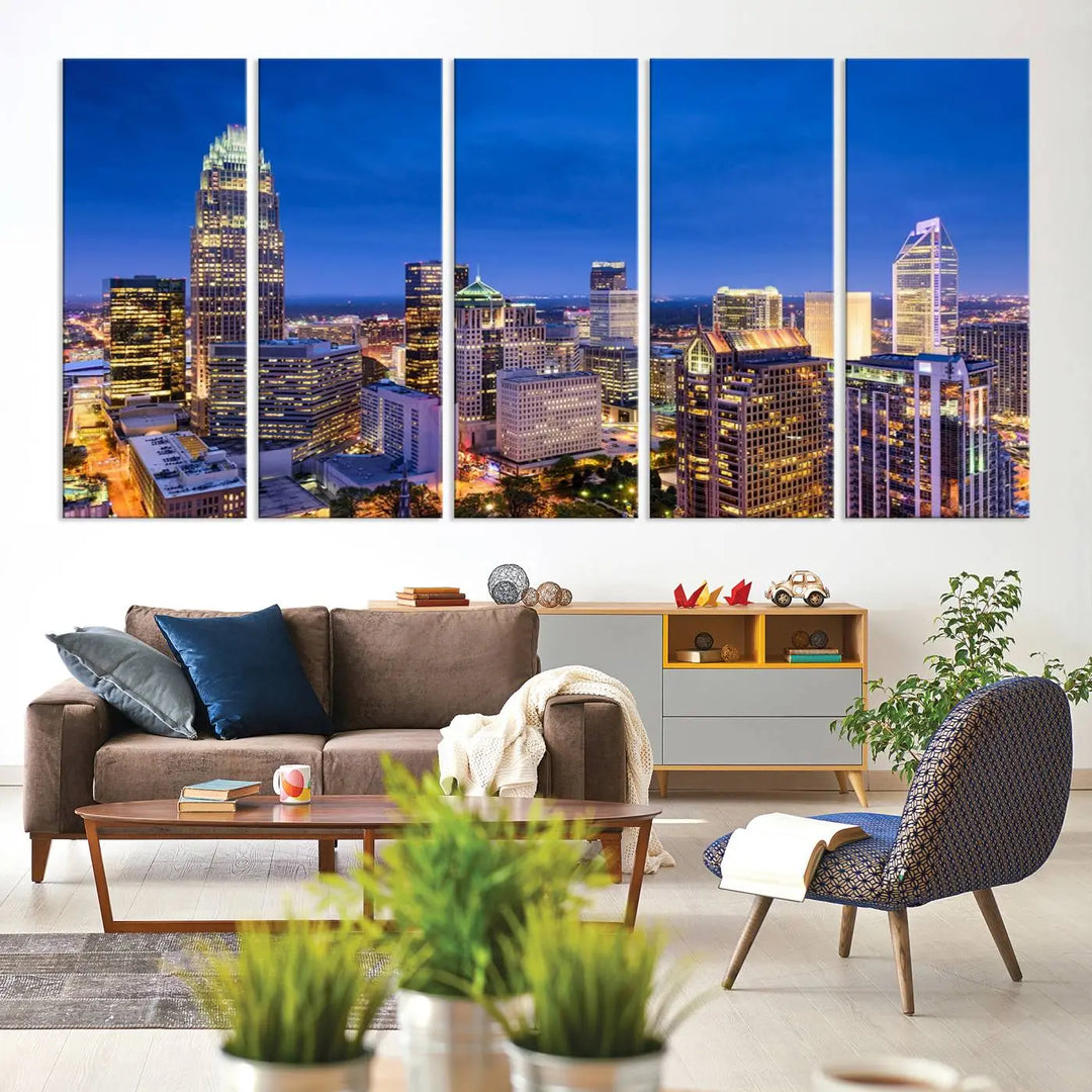 The living room features the "Charlotte City Lights Night Blue Skyline Cityscape View Wall Art Canvas Print" on museum-quality canvas with a UV-protective coating. Cozy and modern decor complements the ready-to-hang look.