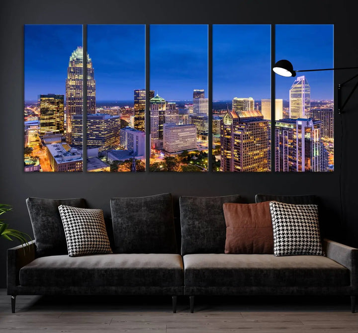 The living room features the "Charlotte City Lights Night Blue Skyline Cityscape View Wall Art Canvas Print" on museum-quality canvas with a UV-protective coating. Cozy and modern decor complements the ready-to-hang look.