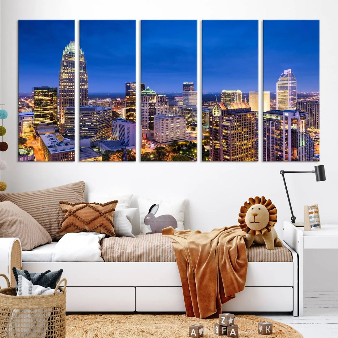 The living room features the "Charlotte City Lights Night Blue Skyline Cityscape View Wall Art Canvas Print" on museum-quality canvas with a UV-protective coating. Cozy and modern decor complements the ready-to-hang look.