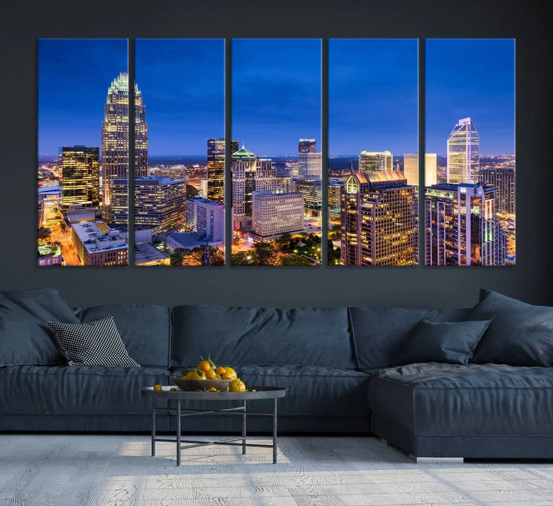 The living room features the "Charlotte City Lights Night Blue Skyline Cityscape View Wall Art Canvas Print" on museum-quality canvas with a UV-protective coating. Cozy and modern decor complements the ready-to-hang look.