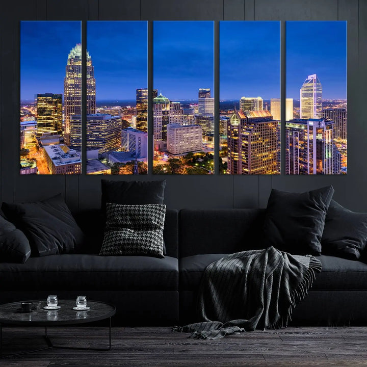 The living room features the "Charlotte City Lights Night Blue Skyline Cityscape View Wall Art Canvas Print" on museum-quality canvas with a UV-protective coating. Cozy and modern decor complements the ready-to-hang look.