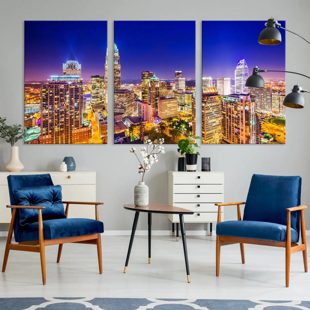 A modern living room features the Charlotte City Lights Night Blue Skyline Cityscape View wall art canvas print.