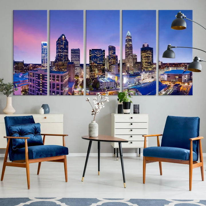 The living room features the "Charlotte City Lights Sunset Purple Skyline Cityscape View Wall Art Canvas Print," a mesmerizing depiction of a city skyline at sunset split into five panels on museum-quality canvas. This gallery-wrapped artwork is enhanced with a UV-protective coating, ensuring that its captivating colors stay vibrant for years.