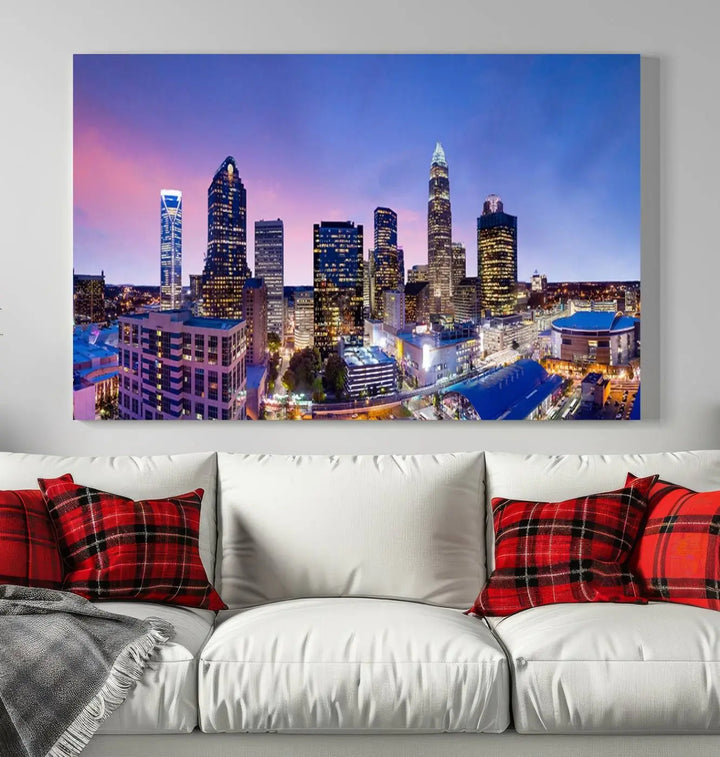 The living room features the "Charlotte City Lights Sunset Purple Skyline Cityscape View Wall Art Canvas Print," a mesmerizing depiction of a city skyline at sunset split into five panels on museum-quality canvas. This gallery-wrapped artwork is enhanced with a UV-protective coating, ensuring that its captivating colors stay vibrant for years.