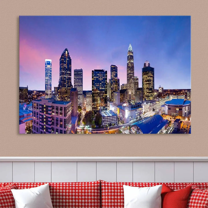 The living room features the "Charlotte City Lights Sunset Purple Skyline Cityscape View Wall Art Canvas Print," a mesmerizing depiction of a city skyline at sunset split into five panels on museum-quality canvas. This gallery-wrapped artwork is enhanced with a UV-protective coating, ensuring that its captivating colors stay vibrant for years.