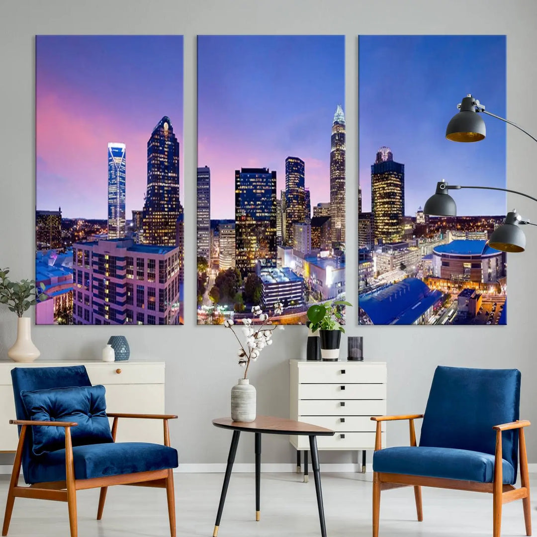 The living room features the "Charlotte City Lights Sunset Purple Skyline Cityscape View Wall Art Canvas Print," a mesmerizing depiction of a city skyline at sunset split into five panels on museum-quality canvas. This gallery-wrapped artwork is enhanced with a UV-protective coating, ensuring that its captivating colors stay vibrant for years.