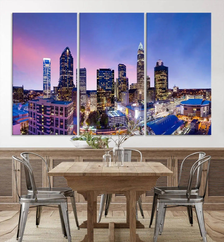 The living room features the "Charlotte City Lights Sunset Purple Skyline Cityscape View Wall Art Canvas Print," a mesmerizing depiction of a city skyline at sunset split into five panels on museum-quality canvas. This gallery-wrapped artwork is enhanced with a UV-protective coating, ensuring that its captivating colors stay vibrant for years.