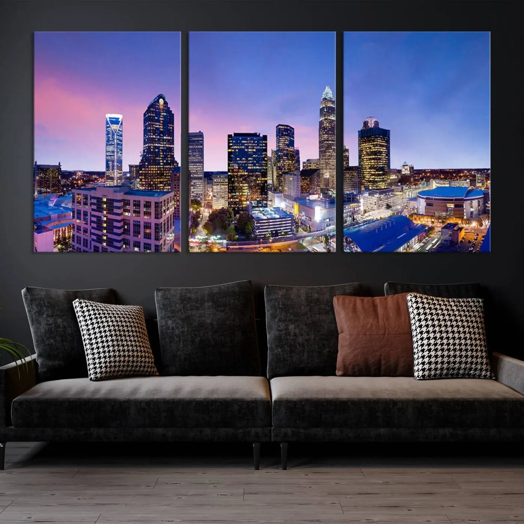 The living room features the "Charlotte City Lights Sunset Purple Skyline Cityscape View Wall Art Canvas Print," a mesmerizing depiction of a city skyline at sunset split into five panels on museum-quality canvas. This gallery-wrapped artwork is enhanced with a UV-protective coating, ensuring that its captivating colors stay vibrant for years.