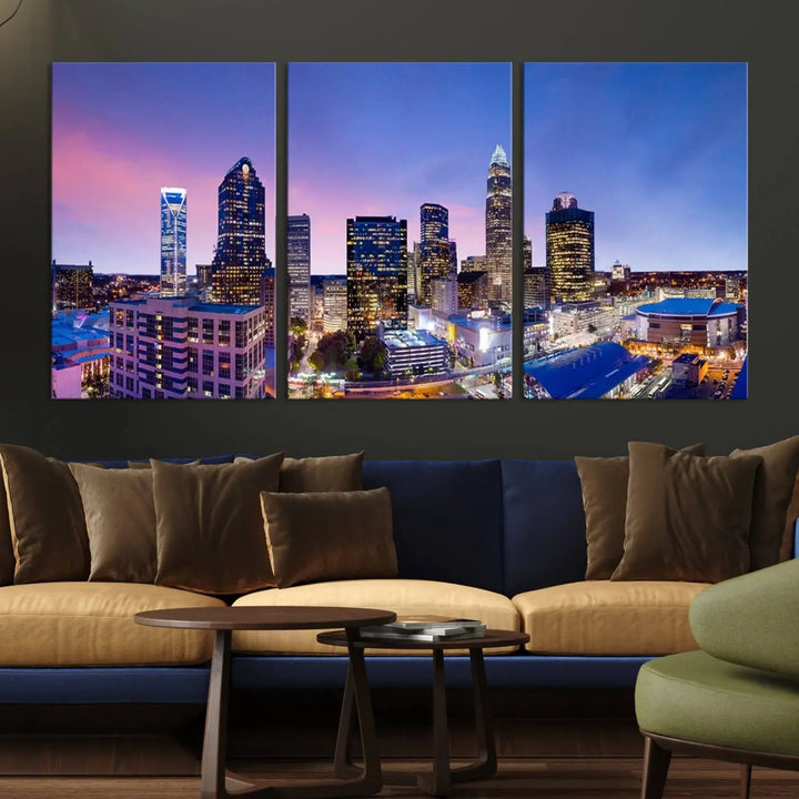 The living room features the "Charlotte City Lights Sunset Purple Skyline Cityscape View Wall Art Canvas Print," a mesmerizing depiction of a city skyline at sunset split into five panels on museum-quality canvas. This gallery-wrapped artwork is enhanced with a UV-protective coating, ensuring that its captivating colors stay vibrant for years.