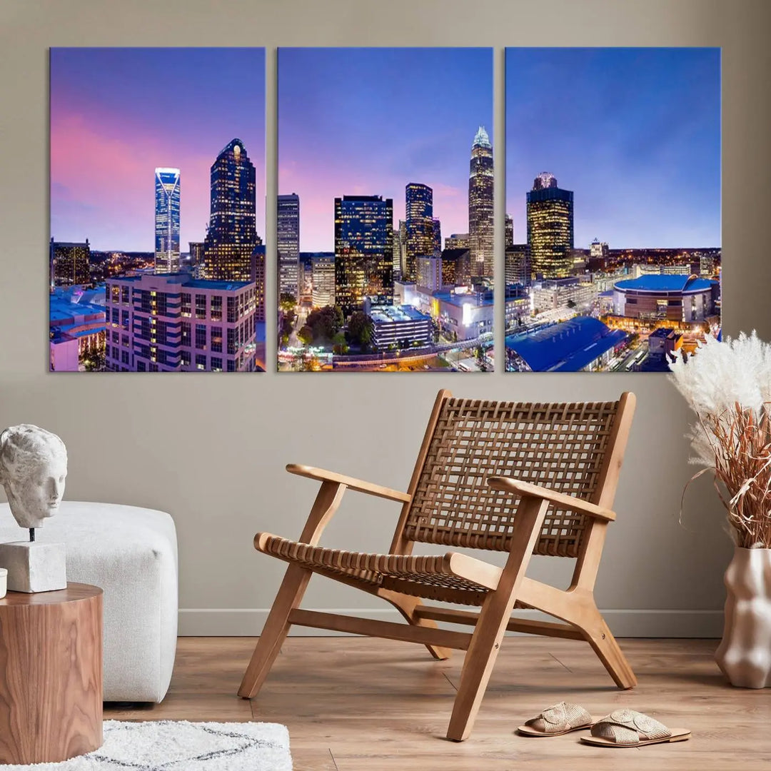 The living room features the "Charlotte City Lights Sunset Purple Skyline Cityscape View Wall Art Canvas Print," a mesmerizing depiction of a city skyline at sunset split into five panels on museum-quality canvas. This gallery-wrapped artwork is enhanced with a UV-protective coating, ensuring that its captivating colors stay vibrant for years.