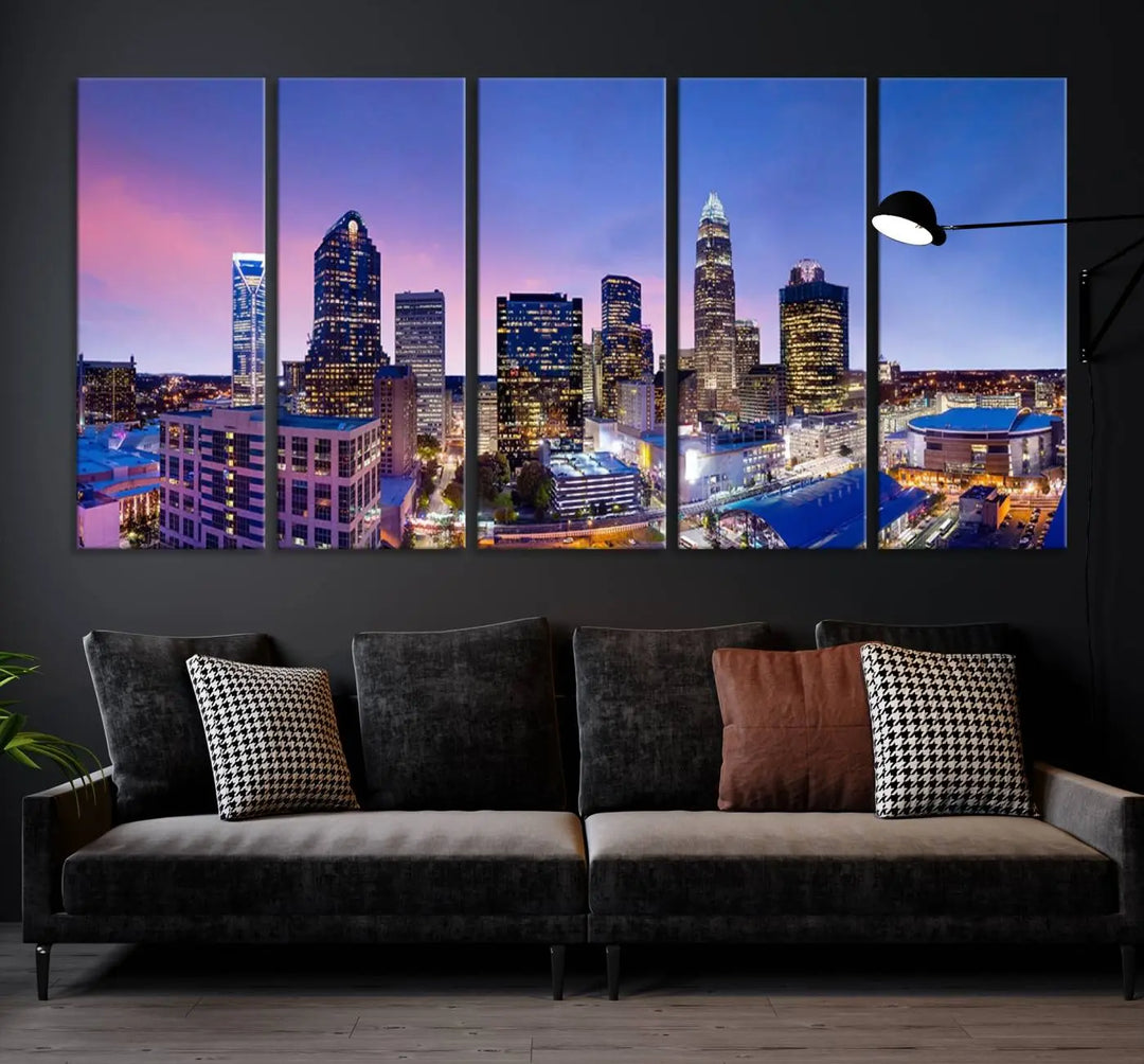 The living room features the "Charlotte City Lights Sunset Purple Skyline Cityscape View Wall Art Canvas Print," a mesmerizing depiction of a city skyline at sunset split into five panels on museum-quality canvas. This gallery-wrapped artwork is enhanced with a UV-protective coating, ensuring that its captivating colors stay vibrant for years.