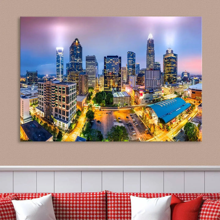 The "Charlotte City Lights Sunset Purple Skyline Cityscape View Wall Art Canvas Print" features a triptych of a vibrant city skyline at dusk, highlighting illuminated skyscrapers and urban streets. This artwork is crafted on museum-quality polycotton canvas, with its gallery-wrapped design ensuring durability and visual appeal for years to come.