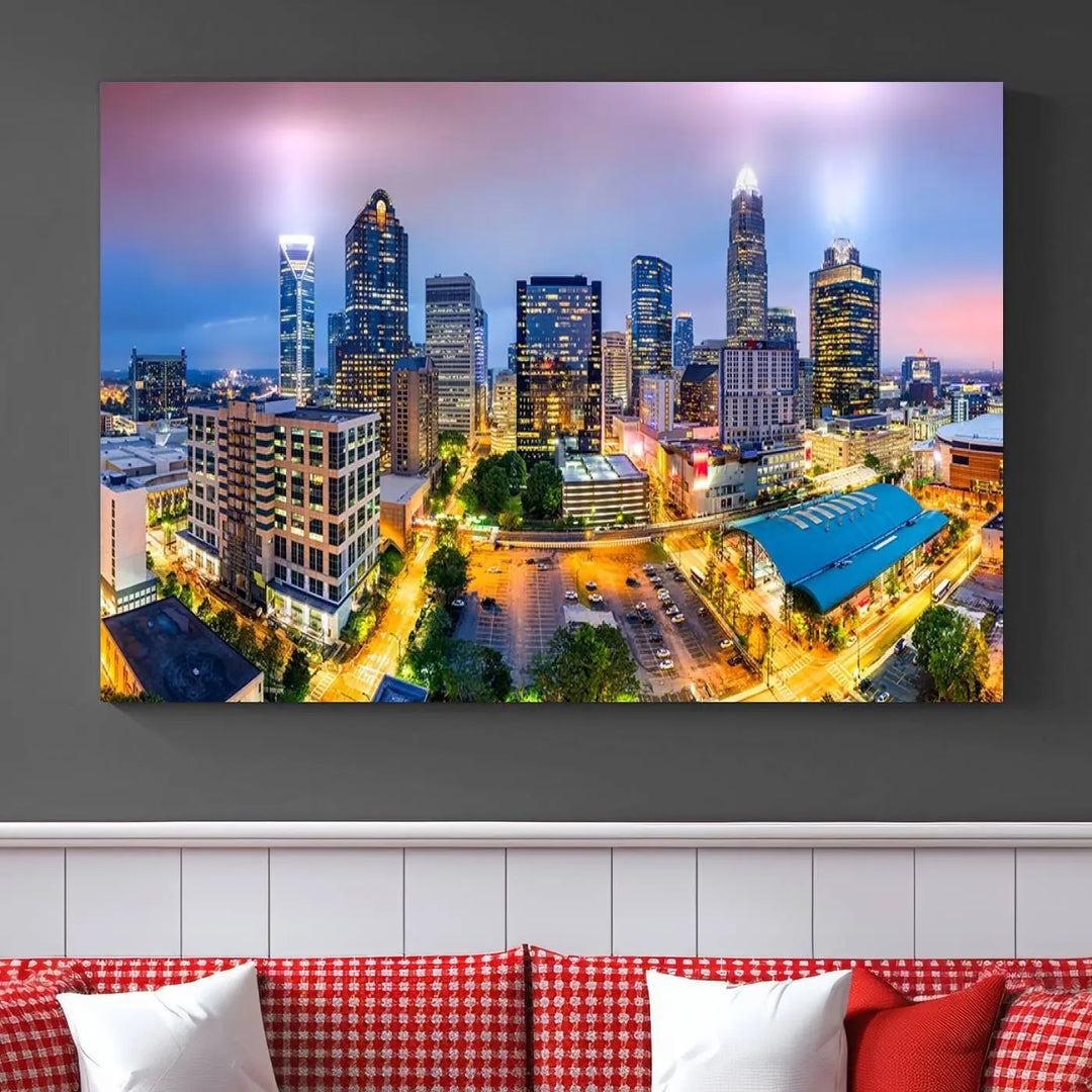 The "Charlotte City Lights Sunset Purple Skyline Cityscape View Wall Art Canvas Print" features a triptych of a vibrant city skyline at dusk, highlighting illuminated skyscrapers and urban streets. This artwork is crafted on museum-quality polycotton canvas, with its gallery-wrapped design ensuring durability and visual appeal for years to come.