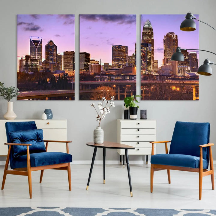 The "Charlotte City Lights Sunset Purple Skyline Cityscape View Wall Art Canvas Print" adorns the modern living room. This museum-quality piece is ready to hang and features a UV-protective coating to preserve its vibrant colors for years.