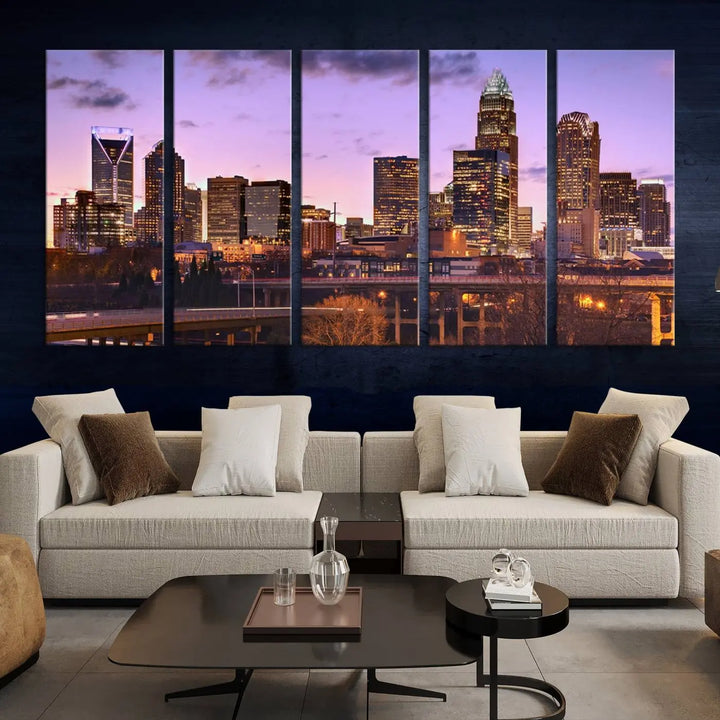 The "Charlotte City Lights Sunset Purple Skyline Cityscape View Wall Art Canvas Print" adorns the modern living room. This museum-quality piece is ready to hang and features a UV-protective coating to preserve its vibrant colors for years.