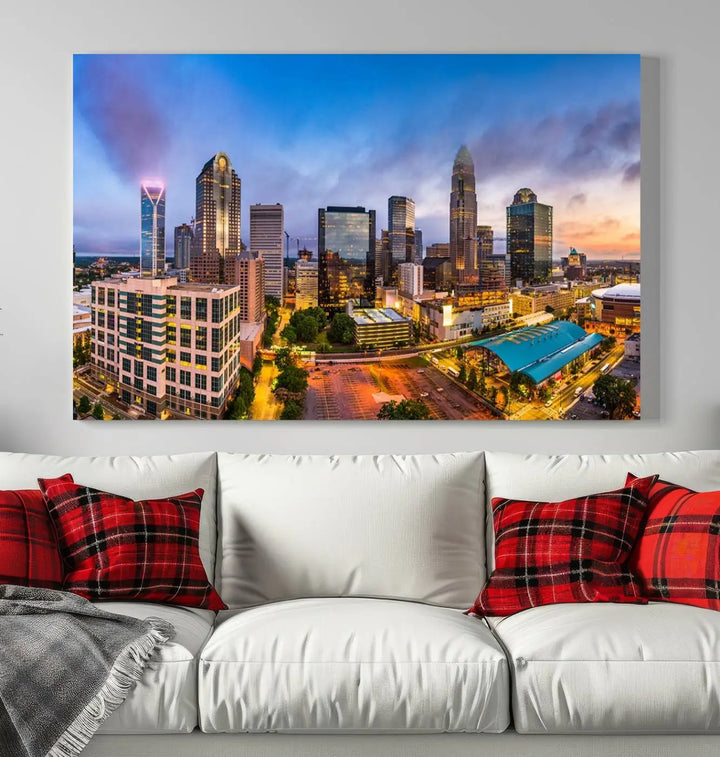 In the living room, a museum-quality, gallery-wrapped canvas titled "Charlotte City Lights Sunset Purple and Blue Skyline" showcases a stunning multi-panel cityscape. The artwork's UV-protective coating guarantees its brilliance for years to come.