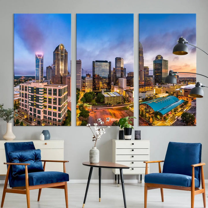 In the living room, a museum-quality, gallery-wrapped canvas titled "Charlotte City Lights Sunset Purple and Blue Skyline" showcases a stunning multi-panel cityscape. The artwork's UV-protective coating guarantees its brilliance for years to come.