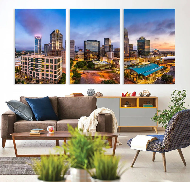 In the living room, a museum-quality, gallery-wrapped canvas titled "Charlotte City Lights Sunset Purple and Blue Skyline" showcases a stunning multi-panel cityscape. The artwork's UV-protective coating guarantees its brilliance for years to come.