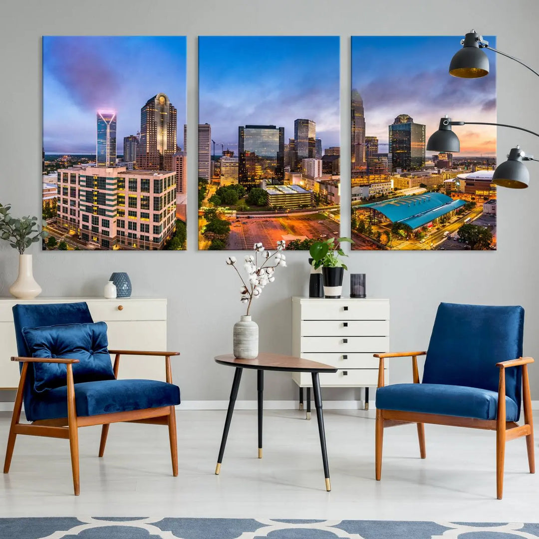 In the living room, a museum-quality, gallery-wrapped canvas titled "Charlotte City Lights Sunset Purple and Blue Skyline" showcases a stunning multi-panel cityscape. The artwork's UV-protective coating guarantees its brilliance for years to come.