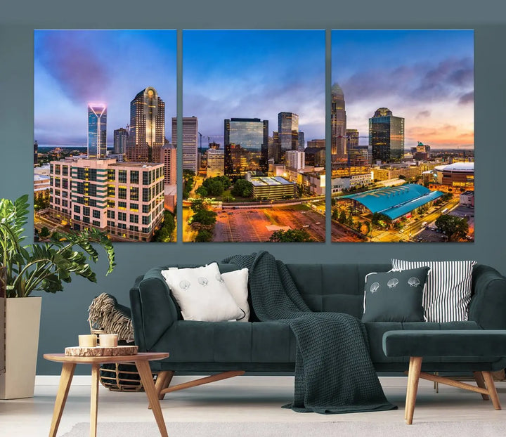 In the living room, a museum-quality, gallery-wrapped canvas titled "Charlotte City Lights Sunset Purple and Blue Skyline" showcases a stunning multi-panel cityscape. The artwork's UV-protective coating guarantees its brilliance for years to come.