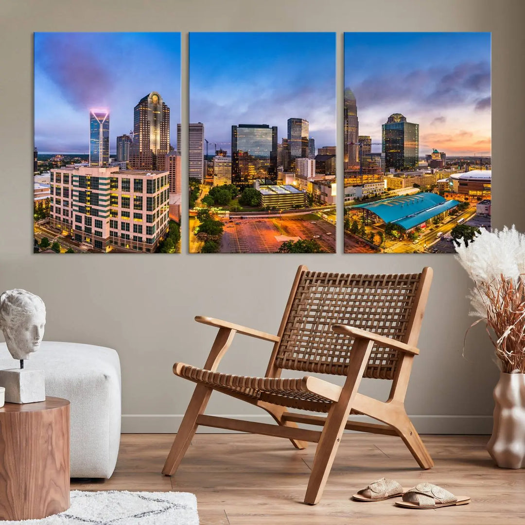 In the living room, a museum-quality, gallery-wrapped canvas titled "Charlotte City Lights Sunset Purple and Blue Skyline" showcases a stunning multi-panel cityscape. The artwork's UV-protective coating guarantees its brilliance for years to come.