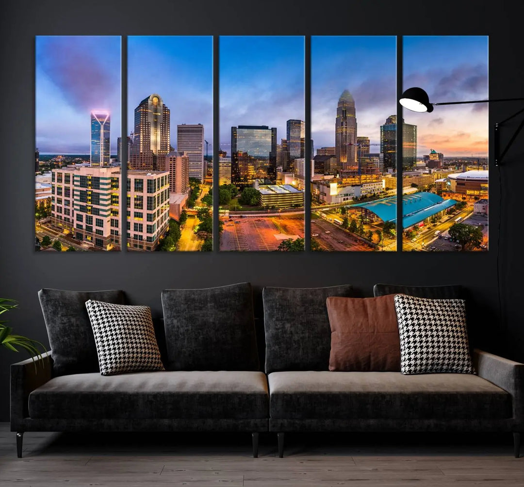 In the living room, a museum-quality, gallery-wrapped canvas titled "Charlotte City Lights Sunset Purple and Blue Skyline" showcases a stunning multi-panel cityscape. The artwork's UV-protective coating guarantees its brilliance for years to come.