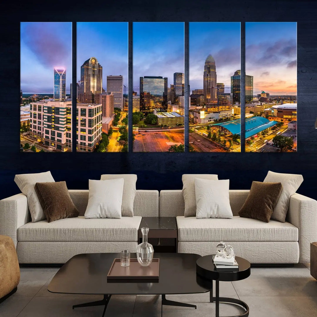 In the living room, a museum-quality, gallery-wrapped canvas titled "Charlotte City Lights Sunset Purple and Blue Skyline" showcases a stunning multi-panel cityscape. The artwork's UV-protective coating guarantees its brilliance for years to come.