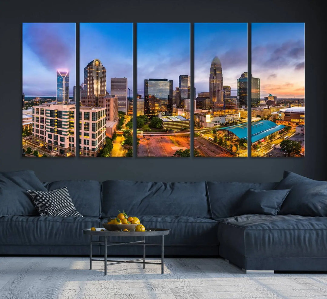 In the living room, a museum-quality, gallery-wrapped canvas titled "Charlotte City Lights Sunset Purple and Blue Skyline" showcases a stunning multi-panel cityscape. The artwork's UV-protective coating guarantees its brilliance for years to come.