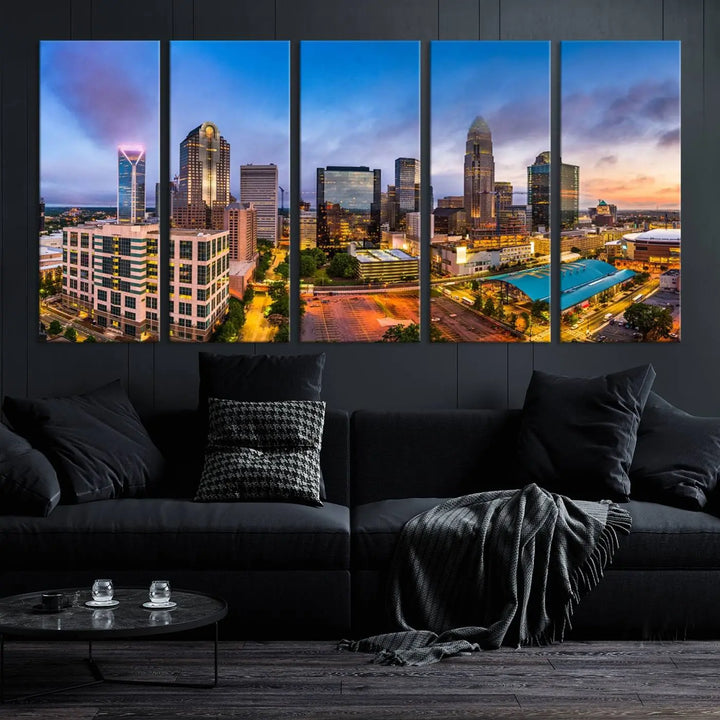 In the living room, a museum-quality, gallery-wrapped canvas titled "Charlotte City Lights Sunset Purple and Blue Skyline" showcases a stunning multi-panel cityscape. The artwork's UV-protective coating guarantees its brilliance for years to come.