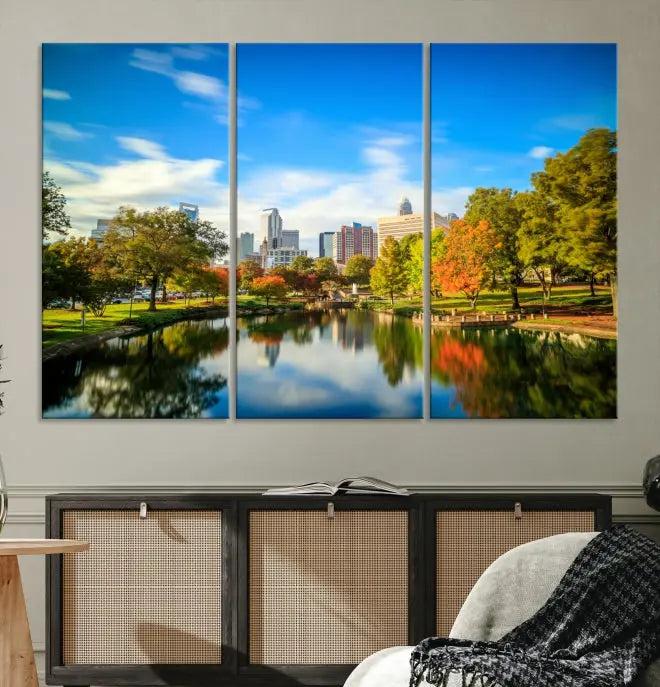 The Charlotte City Park at Spring Skyline Cityscape View Wall Art Canvas Print features a triptych of a city park scene with a calm lake, colorful autumn trees, and skyline. Crafted on museum-quality canvas and hand-assembled with a frame, this artwork is ready to hang and ideal for bringing elegance and serenity to your living space.