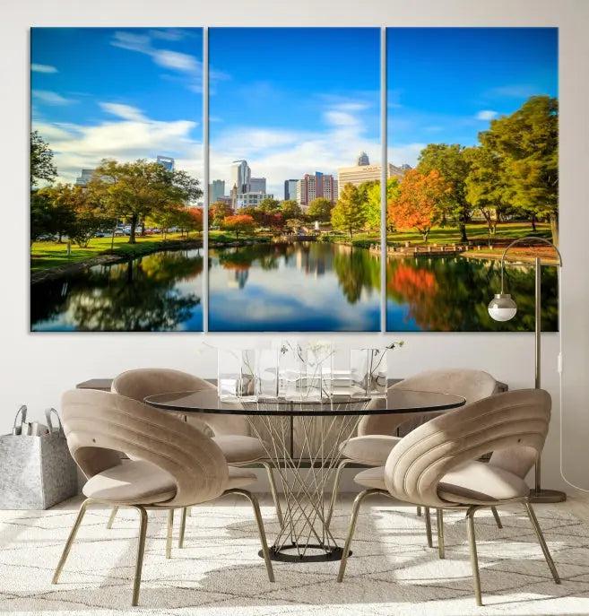 The Charlotte City Park at Spring Skyline Cityscape View Wall Art Canvas Print features a triptych of a city park scene with a calm lake, colorful autumn trees, and skyline. Crafted on museum-quality canvas and hand-assembled with a frame, this artwork is ready to hang and ideal for bringing elegance and serenity to your living space.