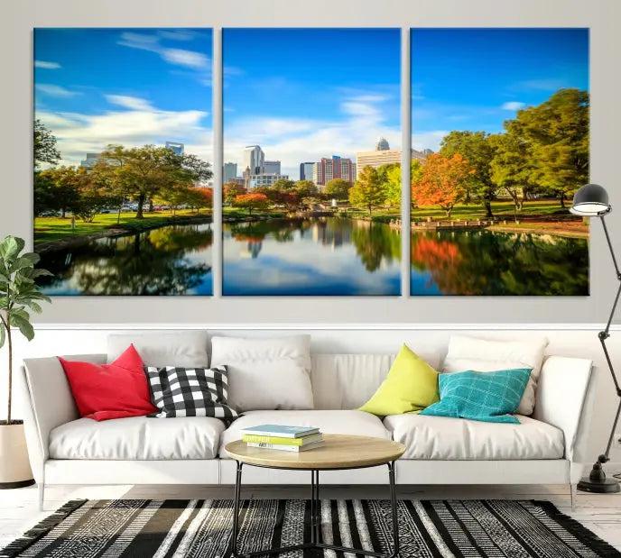 The Charlotte City Park at Spring Skyline Cityscape View Wall Art Canvas Print features a triptych of a city park scene with a calm lake, colorful autumn trees, and skyline. Crafted on museum-quality canvas and hand-assembled with a frame, this artwork is ready to hang and ideal for bringing elegance and serenity to your living space.