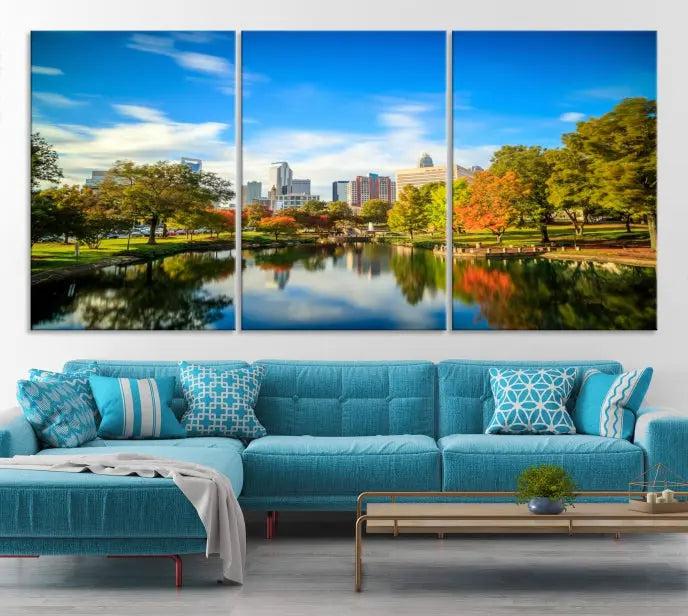 The Charlotte City Park at Spring Skyline Cityscape View Wall Art Canvas Print features a triptych of a city park scene with a calm lake, colorful autumn trees, and skyline. Crafted on museum-quality canvas and hand-assembled with a frame, this artwork is ready to hang and ideal for bringing elegance and serenity to your living space.