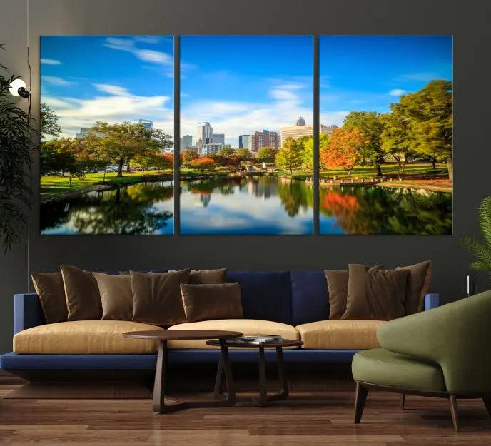 The Charlotte City Park at Spring Skyline Cityscape View Wall Art Canvas Print features a triptych of a city park scene with a calm lake, colorful autumn trees, and skyline. Crafted on museum-quality canvas and hand-assembled with a frame, this artwork is ready to hang and ideal for bringing elegance and serenity to your living space.