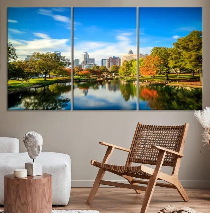 The Charlotte City Park at Spring Skyline Cityscape View Wall Art Canvas Print features a triptych of a city park scene with a calm lake, colorful autumn trees, and skyline. Crafted on museum-quality canvas and hand-assembled with a frame, this artwork is ready to hang and ideal for bringing elegance and serenity to your living space.