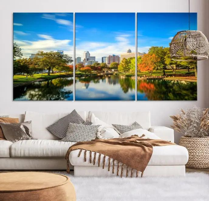 The Charlotte City Park at Spring Skyline Cityscape View Wall Art Canvas Print features a triptych of a city park scene with a calm lake, colorful autumn trees, and skyline. Crafted on museum-quality canvas and hand-assembled with a frame, this artwork is ready to hang and ideal for bringing elegance and serenity to your living space.