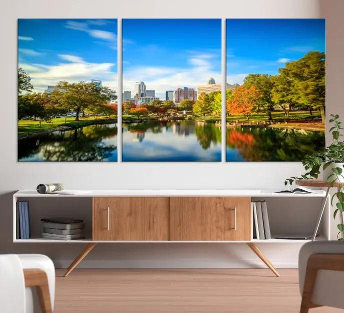 The Charlotte City Park at Spring Skyline Cityscape View Wall Art Canvas Print features a triptych of a city park scene with a calm lake, colorful autumn trees, and skyline. Crafted on museum-quality canvas and hand-assembled with a frame, this artwork is ready to hang and ideal for bringing elegance and serenity to your living space.