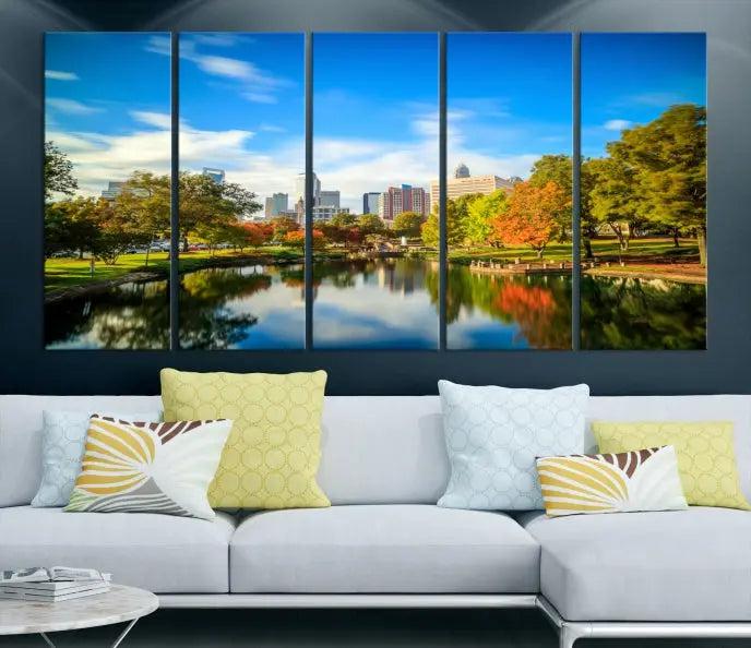 The Charlotte City Park at Spring Skyline Cityscape View Wall Art Canvas Print features a triptych of a city park scene with a calm lake, colorful autumn trees, and skyline. Crafted on museum-quality canvas and hand-assembled with a frame, this artwork is ready to hang and ideal for bringing elegance and serenity to your living space.