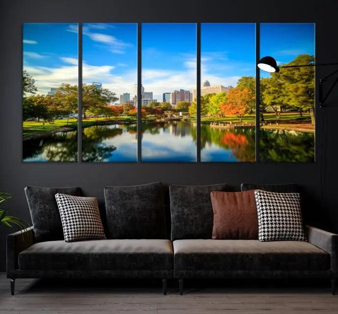 The Charlotte City Park at Spring Skyline Cityscape View Wall Art Canvas Print features a triptych of a city park scene with a calm lake, colorful autumn trees, and skyline. Crafted on museum-quality canvas and hand-assembled with a frame, this artwork is ready to hang and ideal for bringing elegance and serenity to your living space.