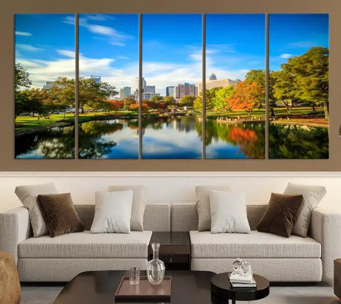 The Charlotte City Park at Spring Skyline Cityscape View Wall Art Canvas Print features a triptych of a city park scene with a calm lake, colorful autumn trees, and skyline. Crafted on museum-quality canvas and hand-assembled with a frame, this artwork is ready to hang and ideal for bringing elegance and serenity to your living space.